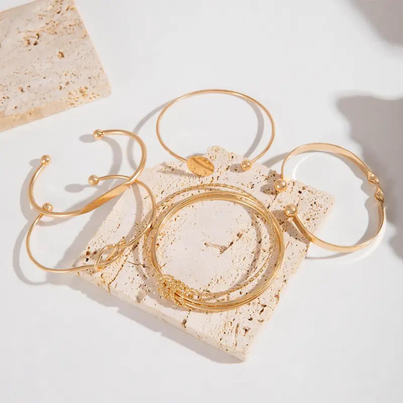 Set de pulseras nudo de elegancia | Oro