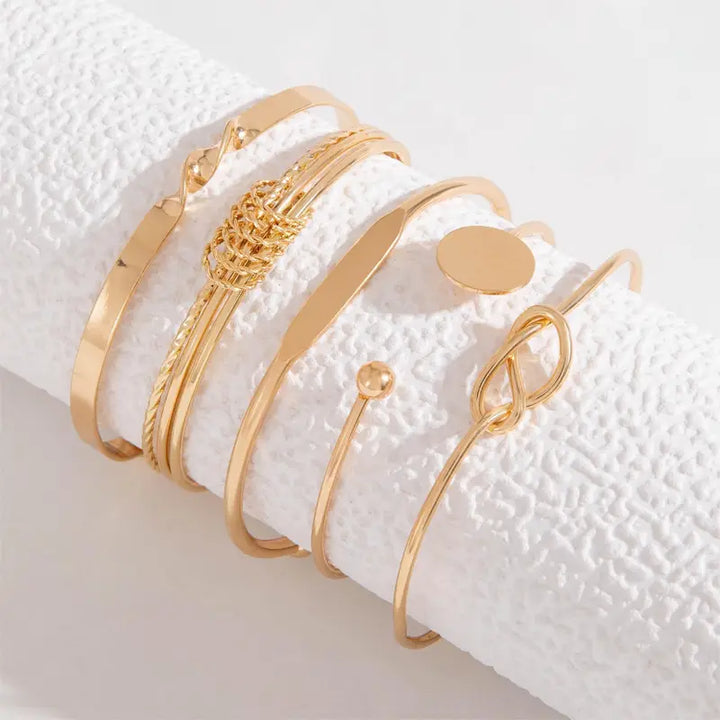 Set de pulseras nudo de elegancia | Oro