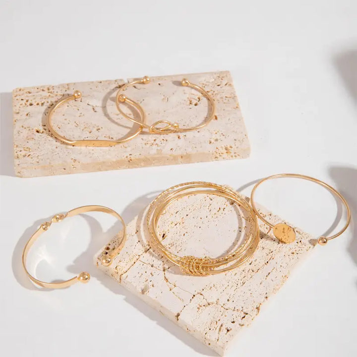 Set de pulseras nudo de elegancia | Oro