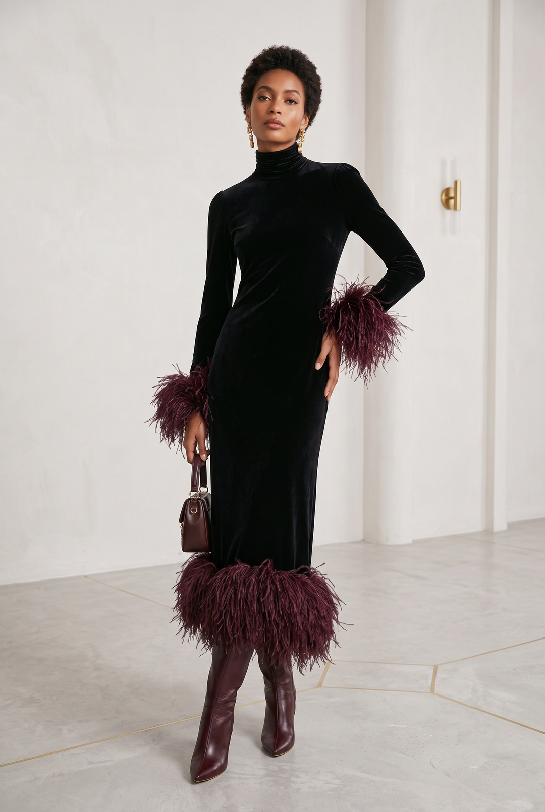 Black velvet patchwork maxi dress with faux ostrich feather cuffs and hem - front view