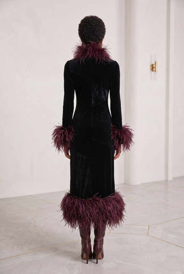 Black velvet patchwork maxi dress with faux ostrich feather cuffs and hem - back view