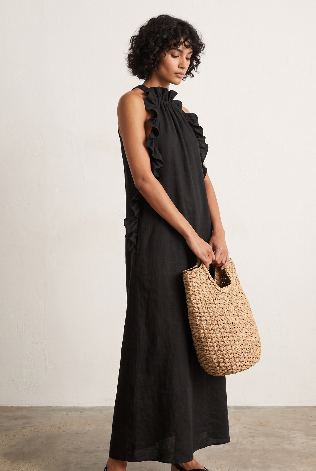 Black linen blend sleeveless maxi dress with ruffle details - front view